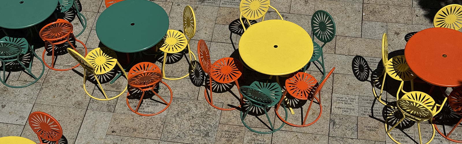 Union chairs and tables in multiple colors viewed from above.